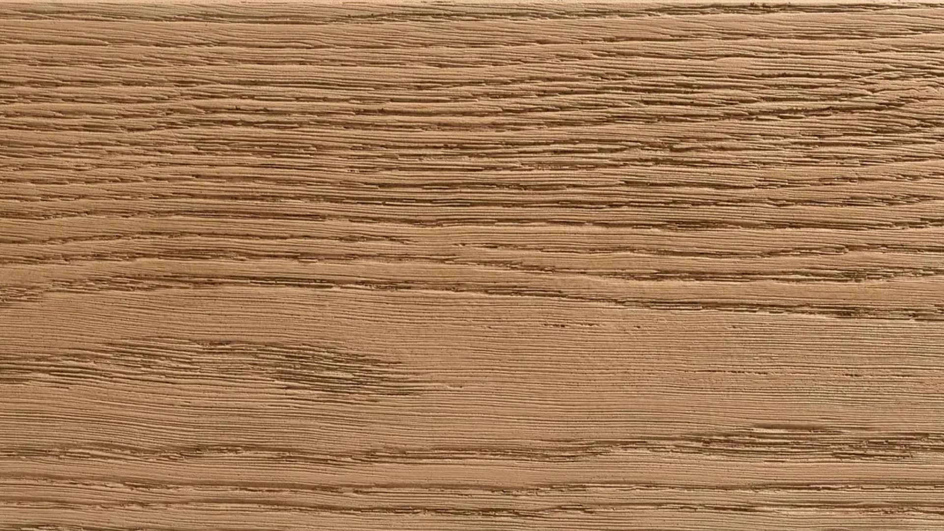 Millboard Composite cladding in Golden oak