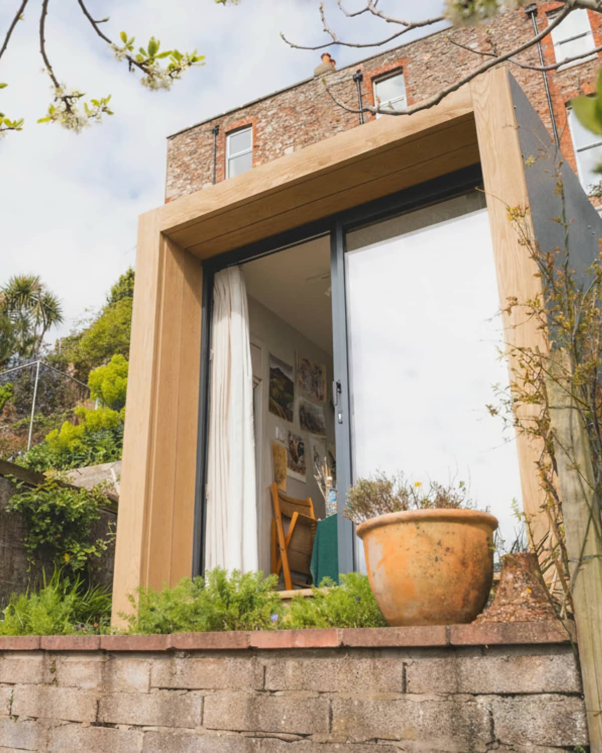 Exterior of Sue's room with the door open.