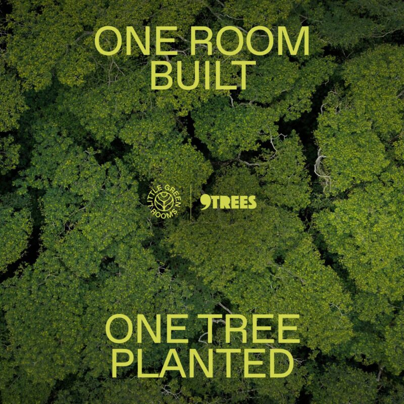 Aerial view on trees with text 'One room built. One tree planted'.