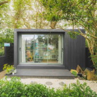 Exterior image of Delyth's room at the bottom of her garden.