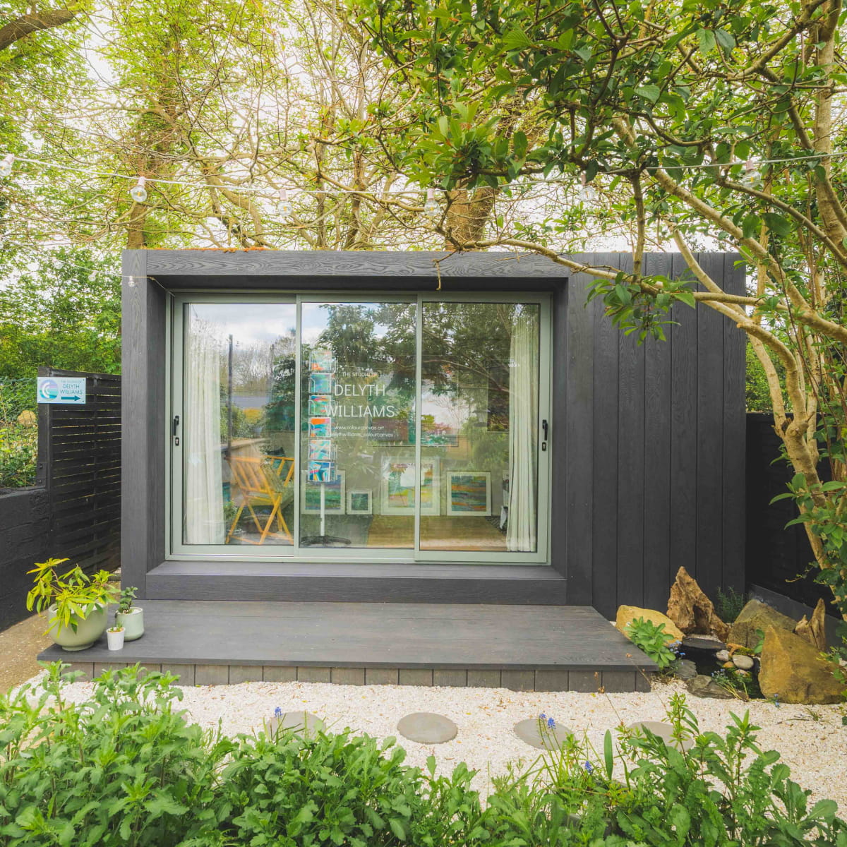 Exterior image of Delyth's room at the bottom of her garden.