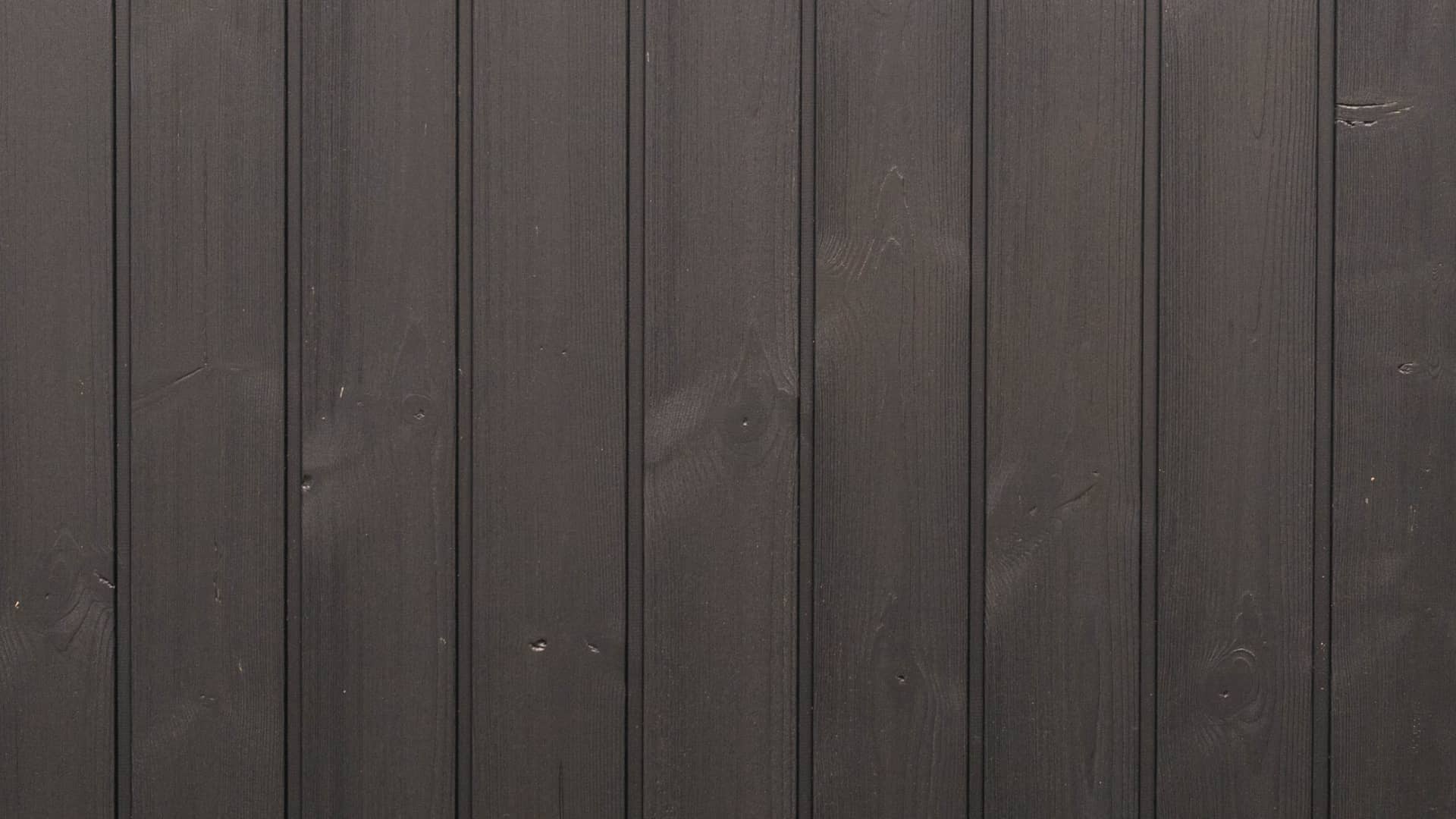 Timber cladding in charcoal black.
