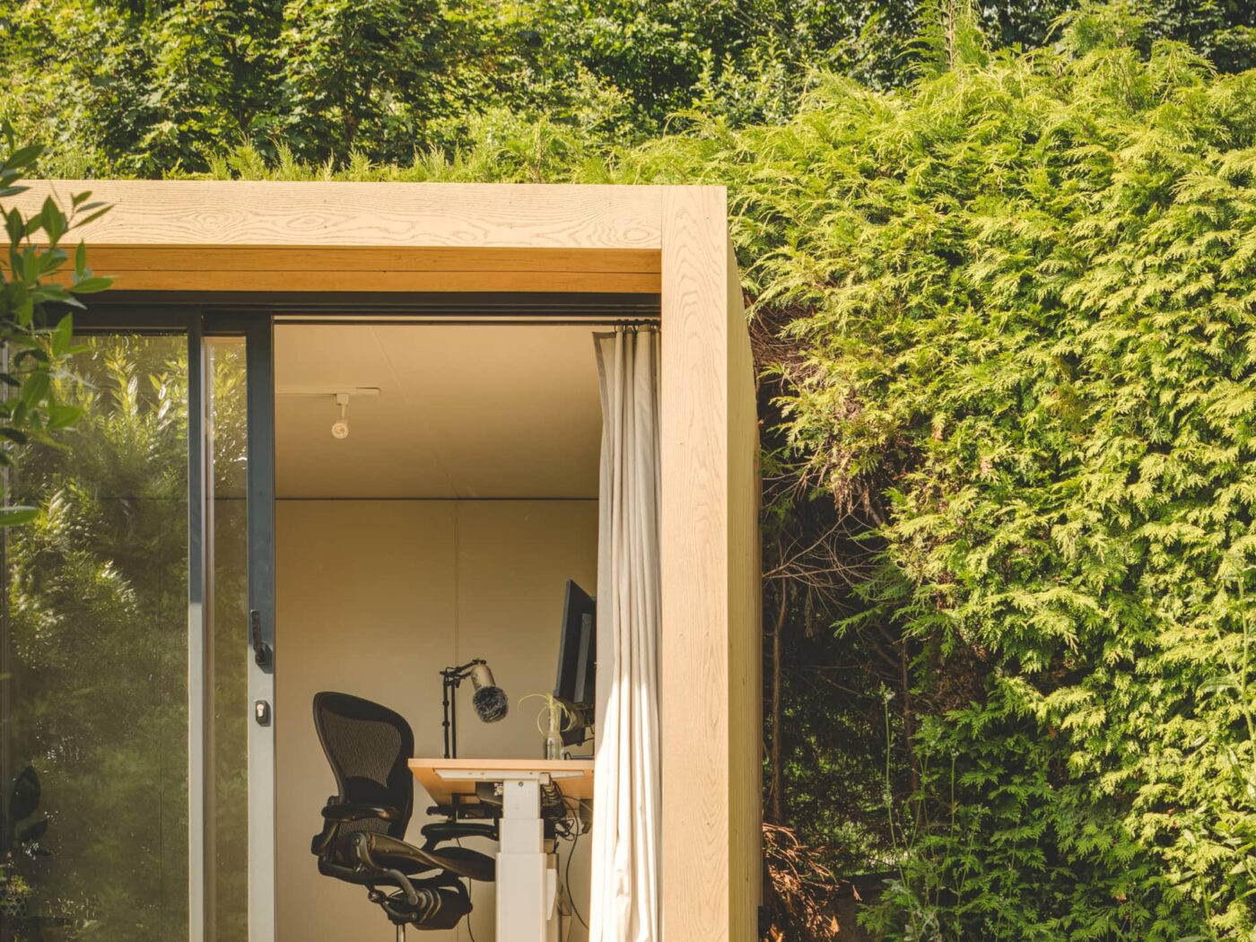 Little Green Room in golden oak with studio set up inside.