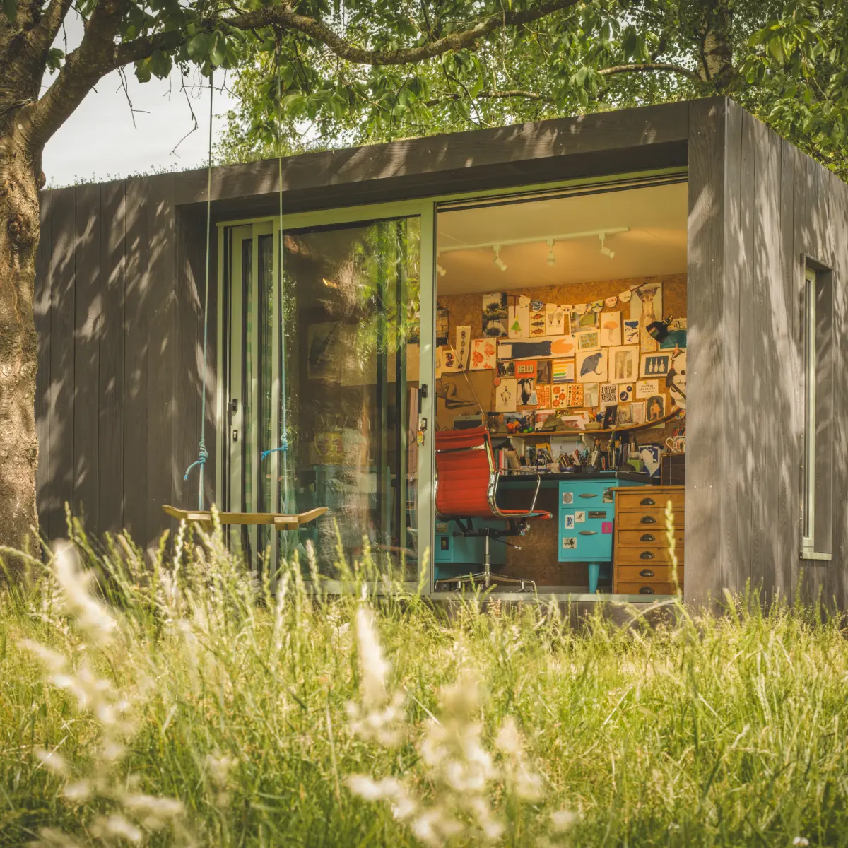 Exterior of Little Green Room in burnt cedar.