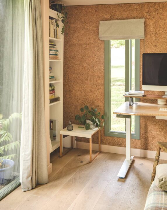 Interior of Little Green Room. Oak floor and cork wall.