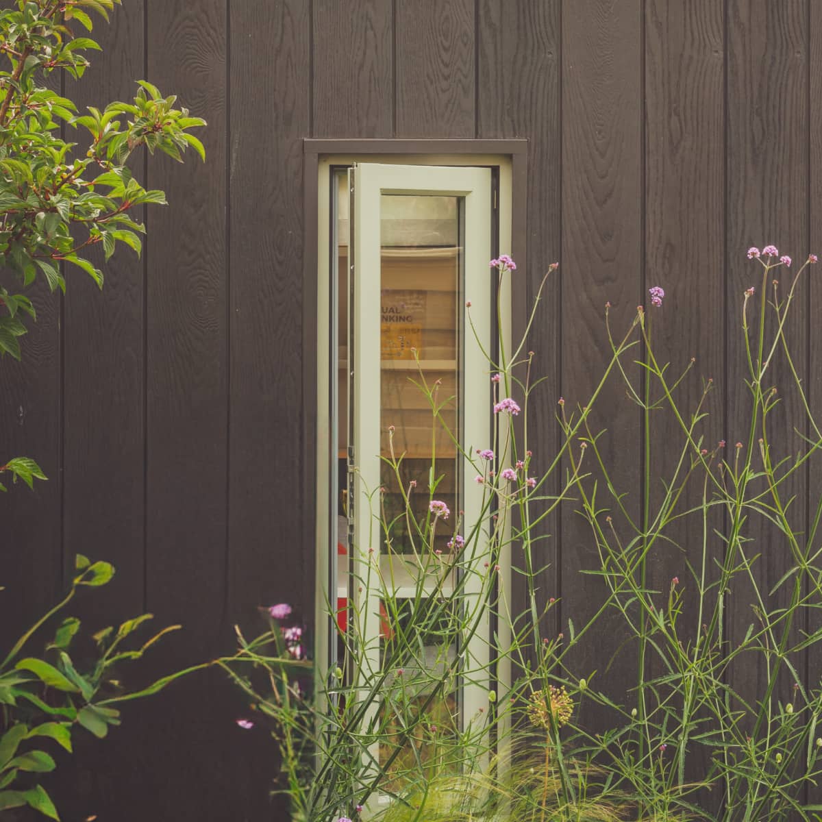 Little Green Room in burnt cedar with side window