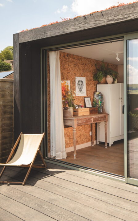 Little Green Room in burnt cedar. Doors open and cork wall.