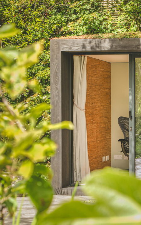 Little Green Room in burnt cedar with the door open.