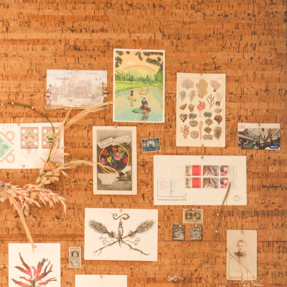 Little Green Room cork wall with art pinned in.