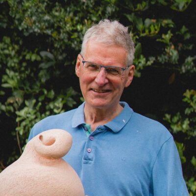 Portrait of Andrew Dalton in his garden.