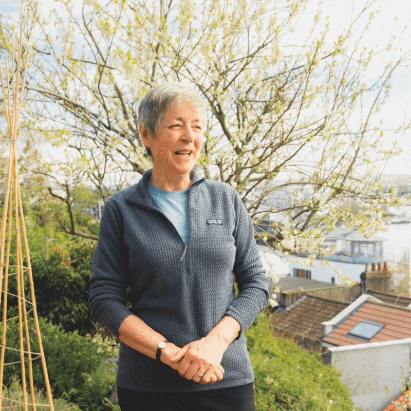 Portrait of Sue in her garden.