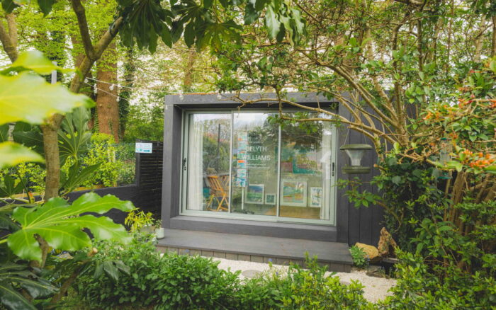 Exterior of Delyth's Little Green Room at the bottom of the garden.
