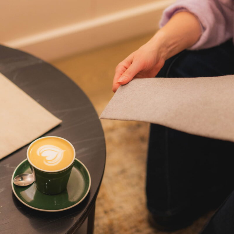 Coffee and fabric in a design meeting