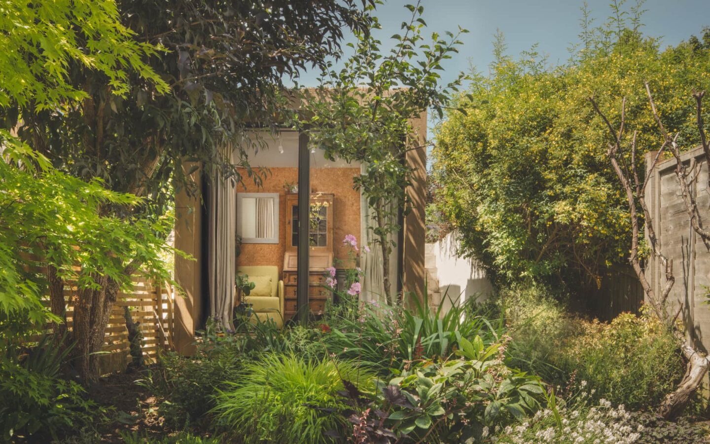 Little Green Room surrounded by greenery