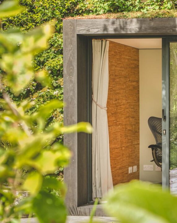 Little Green Room exterior in burnt cedar